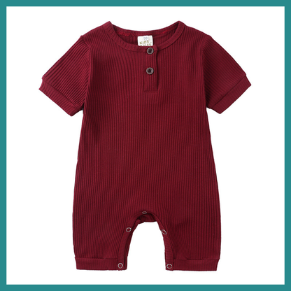 Barboteuse Mixte  – Un indispensable de la garde-robe estivale de bébé, alliant confort, style et praticité.