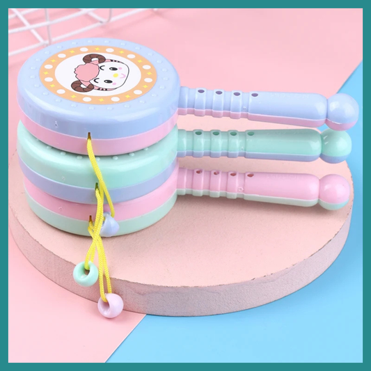 Tambour À Hochet En Plastique Pour Bébé  – Un Petit instrument Idéal Pour éveiller Les Sens Et Accompagner Les Moments De Jeu Et De Découverte